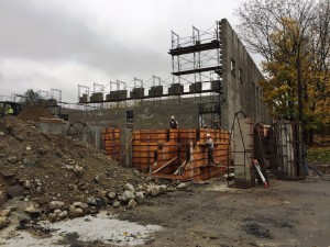 Forms are being laid out to pour steps & a concrete landing for the emergency exit at the rear of the gymnasium.