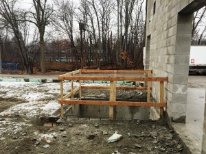This hole, just outside the gamesroom and on the first floor of the addition in the back of the building will house the new elevator.